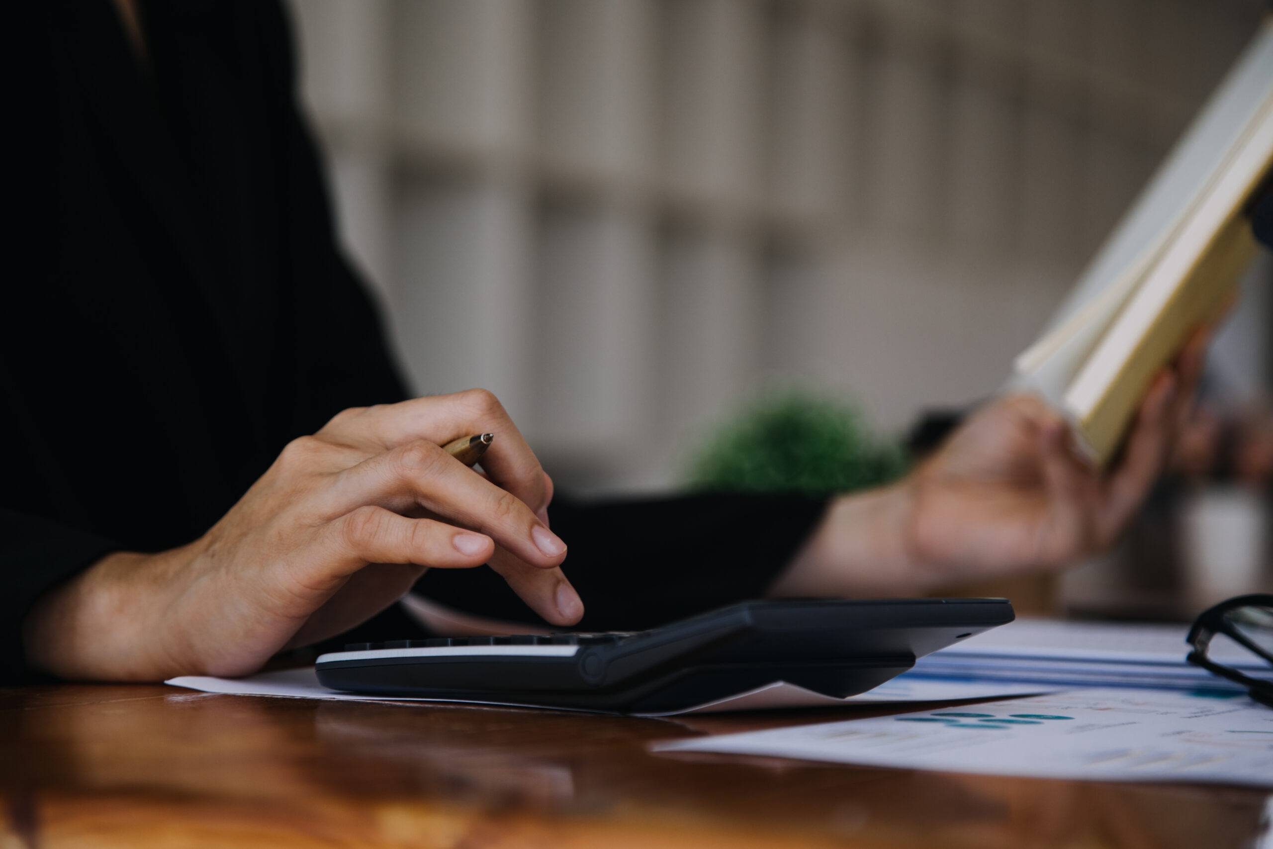 asian businesswoman using laptop computer and working at office