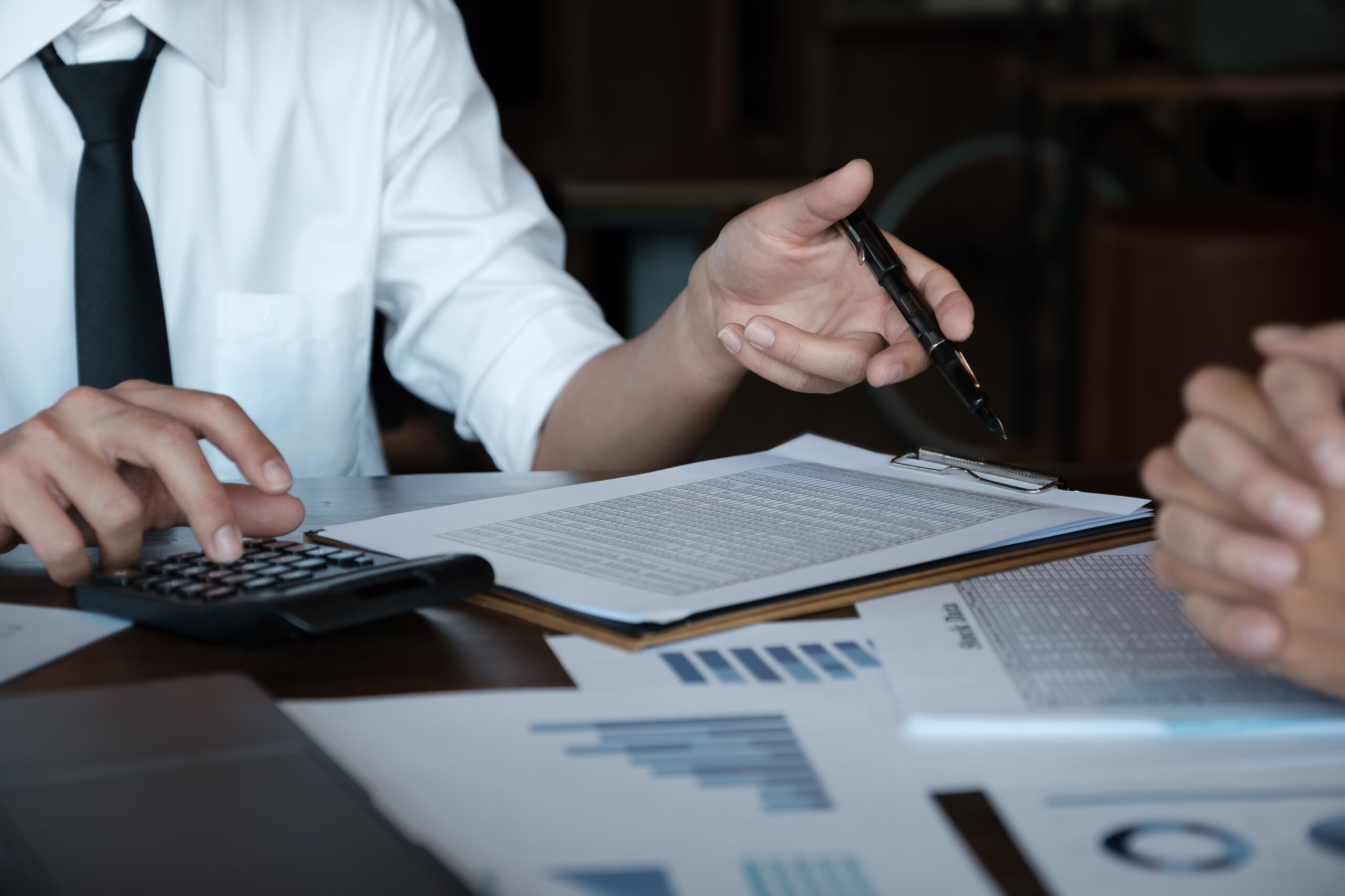 economic research discussions, business team analyzing income ch